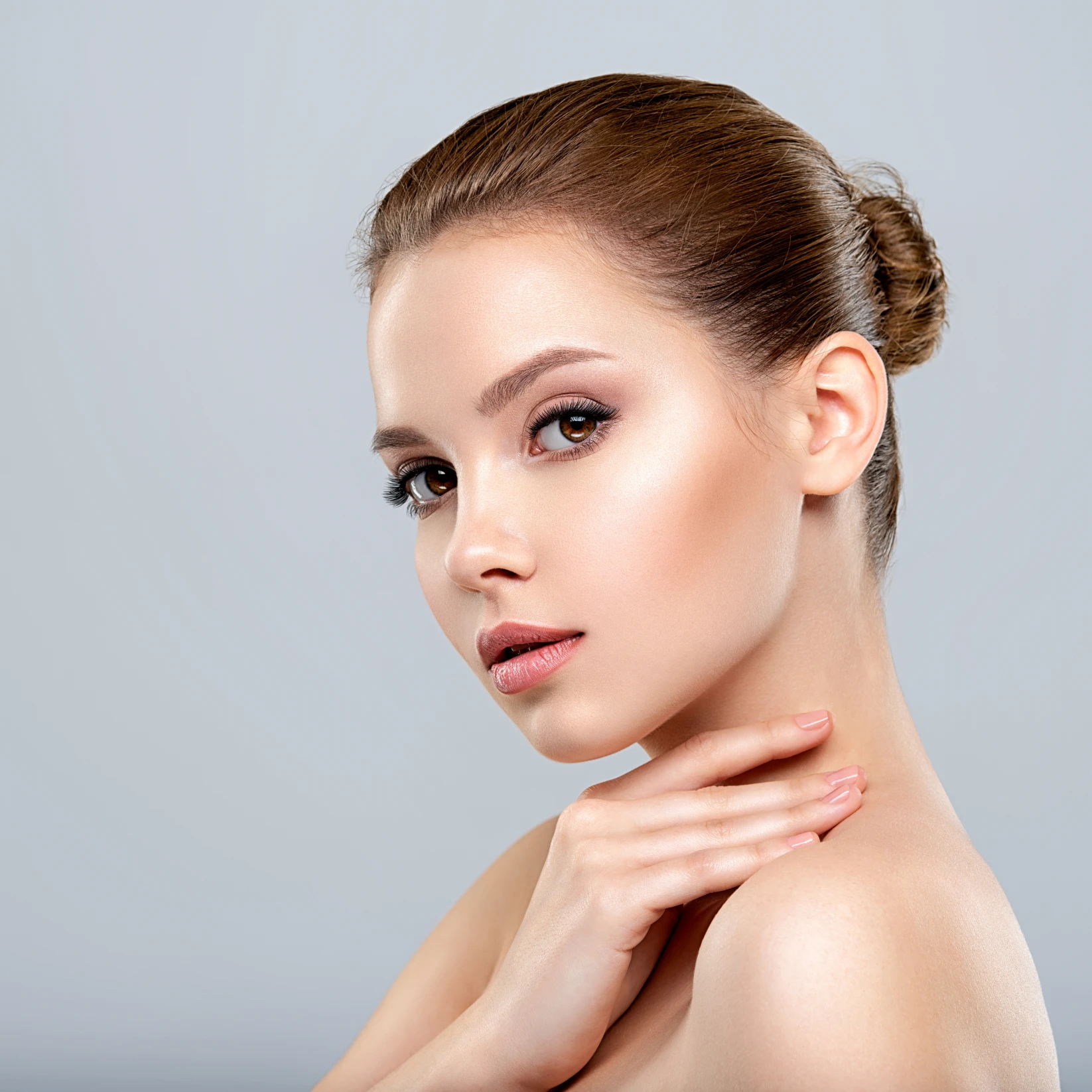 lose-up of a woman’s glowing, flawless skin and defined jawline, showcasing skincare results at The Better Body Shop MedSpa in Houston, TX